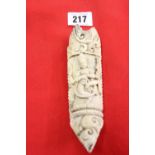 Tibet/China: 19th cent. Tibetan bone dress ornament depicting a deity 5ins. NB This item was brought