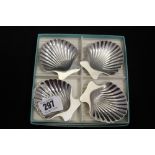 Tiffany and Co sterling silver shell shaped nut dishes 4½oz and boxed. (4).