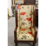 19th cent. Mahogany wing back chair, upholstered in a contemporary style. The chair has a later