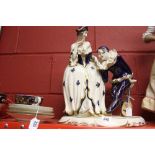 20th cent. Ceramics: Royal Dux, Bohemia Porcelain figurine lady and Pierrot decorated in blue and