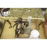 20th cent. Wall sconce in the form of a putti holding a light. (Must be re-wired). Plus an art