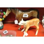 Beswick: Hereford calf and a stallion dark bay.