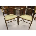 Edwardian Salon chairs, tub shaped cresting rail, upholstered seat. A pair.