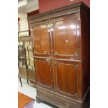 19th cent. Mahogany wardrobe with twin doors over single drawer, interior fabric lined. The whole on