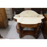 19th cent. Mahogany Duchess marble top washstand. Ornate turned & carved front columns and ceramic