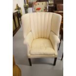 19th cent. Upholstered wing back chair.