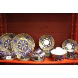 Late 19th early 20th cent. Coalport blue/gilt part teaset, gilt ground, blue Imari style design.