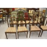 20th cent. Mahogany dining room chairs, 7 & 1 carver. Flocked upholstered with drop in seats. (8).