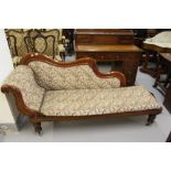 19th cent. Mahogany upholstered chaise longue with scrolled back.