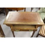 19th cent. Mahogany side table, single drawer leather skiver turned supports rising off ceramic