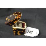 19th cent. Sewing Requisites: Tortoiseshell thimble case of knife box form, conical stand to front