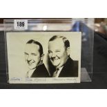 Autographs: Stan laurel and Oliver Hardy signed on a photo.