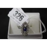Diamond Jewellery: Art deco style marquise shaped ring set with central sapphire, approx. 85 points,