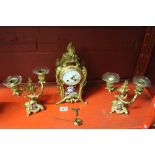 19th cent. French Clocks: Vinconti Paris gilt ormolu garniture, red and white enamel painted panels,