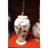 20th cent. Moorcroft: Aquilegia pattern lamp, tube lined decoration. 10½ins.