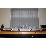 Models: The German battle ship "Bismark" scale model. 51½ins. x 13ins. x 9ins.