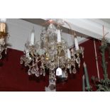 French moulded glass and gilt-metal six-branch chandelier, of small size, the baluster stem