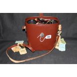 20th cent. Binoculars: Carl Zeiss Jena Jenoptem 7 x 50W stamped "DDR" No 4500582 leather hard case