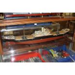 Models: Scale model of a cargo vessel, mounted in a display case. 40½ins. x 14¼ins. x 7ins.