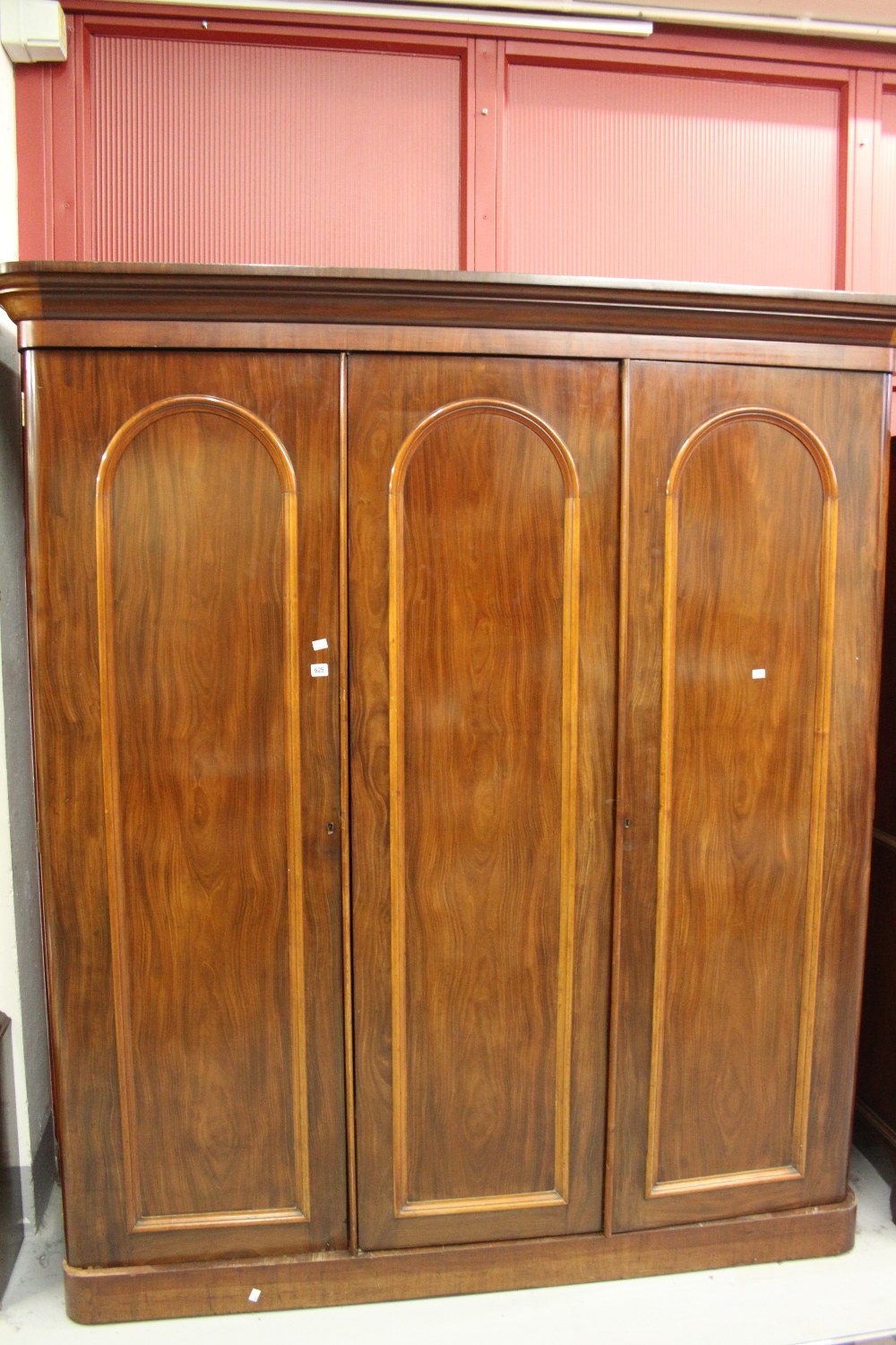 19th cent. Mahogany compactum, dome moulding to door fronts, double hanging compartments, single