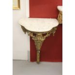Antiques/Showbusiness: 19th cent. Continental gilt gesso console tables, the veined white marble