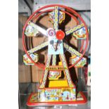 Toys: 1950s Mickey Mouse tin plate wind-up Ferris Wheel - boxed. 16½ins.