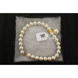 Faux Pearl Necklace with central pearl drop by Napier, boxed.