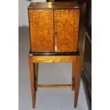 19th cent. Burr wood gentleman's specimen/teapoy cabinet, two doors open to reveal three drawers
