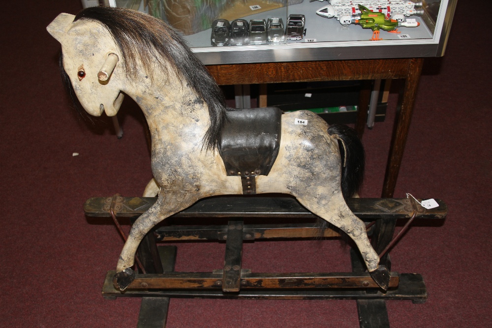 20th cent. Toys: Child's rocking horse, glass eyes, real horsehair mane & tail, leatherette saddle