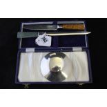 Hallmarked Silver: Desk furniture Capston inkwell, London 1913, worn marks. Paper knife,