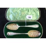 Hallmarked Silver: Berry spoons, Sheffield 1902, Walker Hall, cased - a pair. 4½ozs.