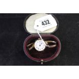 20th cent. Ladies 9ct. gold wristwatch on expanding bracelet.