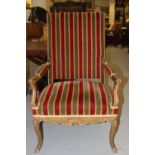 Regency style gilt wood fauteuil, c1860, the rectangular upholstered back continuing to padded