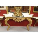 Antiques: Superb mid 19th cent. continental rococo revival gilt wood console table, the serpentine