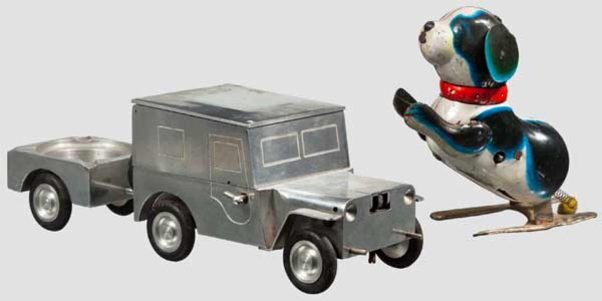 Jeep als Zigarettenschachtel, dazu springender Hund Jeep aus Aluminium, das Dach aufklappbar für den