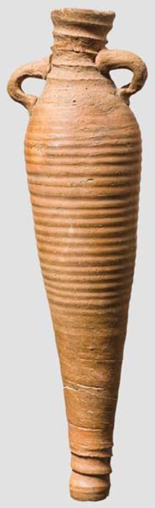 Spätantike Amphore, ägyptisch, 5. - 7. Jhd. Kleine, spindelförmige Amphore aus rotbraunem Ton mit