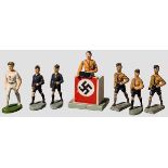 Sieben Elastolin- und Lineol-Figuren, Hitler mit Rednerpult, Pimpfe und Turnerbund Sieben politische