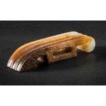 A Jade Carving of Sword Slide Shape , Han Dynasty 漢弦紋玉劍彘 Scabbard slide is one of the archaic jade