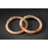 A Pair of Round Bangles with Circle Conjoined Dragon in Skein Pattern, Han Dynasty 漢代絞絲紋龍咬尾手鐲 （圓口一對）