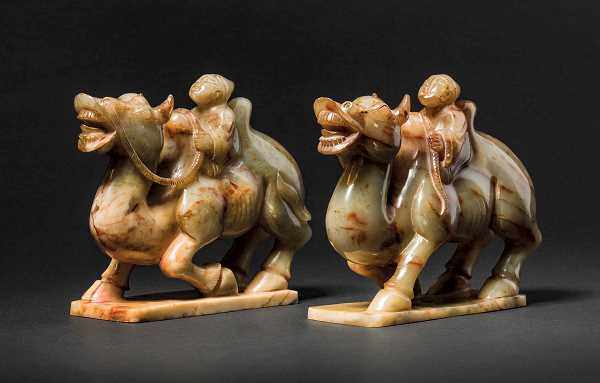 A Pair of Jade Carvings ' Ethnic Merchants on Camels', Tang Dynasty 唐玉雕胡人駝商擺件（一對） Camel is the