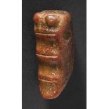 A Carved Jade Cicada, Shang Dynasty 商代玉雕蟬 Width 2.4 cm, height 5.6 cm. 寬 2.4 cm, 長 5.6 cm.