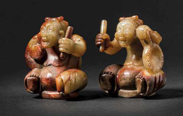 A Pair of Jade Figures ' Ethnic Musicians', Han Dynasty 漢玉雕鼓樂人物像（一對） Hetian celadon jade with russet