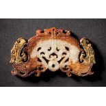 A Gilded Jade Pendant with ‘Double Dragon Heads’ Motif and Grain Design, Han Dynasty 漢代玉雕谷紋雙龍首貼金玉佩