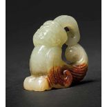 A Mythical Figure with Beast tail, Western Zhou Dynasty 西周獸尾神人 Width 4.7 cm, height 4.4 cm. 寬 4.7