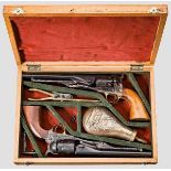Ein Paar Colt Mod. 1860 Army, Westerner's Arms, im Kasten Kal. .44 Perk., Nr. A11321 + A11322.