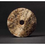 A Celadon Jade Bi-disc with Dragon Design, Western Zhou Dynasty 西周龍紋青白玉壁 A Hetian celadon jade