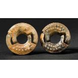 A Pair of Interlinked Double Jade Yuan, Han Dynasty 漢勾連紋環扣玉瑗（一對） Diameter 5.9 cm, each. 直徑 5.9 cm.