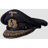 A Visor Cap for an Admiral of the Kriegsmarine Navy-blue cloth, black mohair trim band, re-sewn