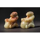 A Pair of Jade Figures 'Ethnic Musicians', Tang Dynasty 唐胡人鼓樂人擺件（一對） Tang Dynasty enjoyed a peaceful