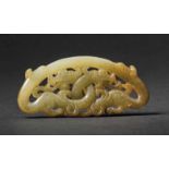 A Jade Huang Openwork with Dragon Design, Han Dynasty 漢代透雕龍紋玉璜 Width 8.2 cm, height 3.6 cm. 寬 8.2